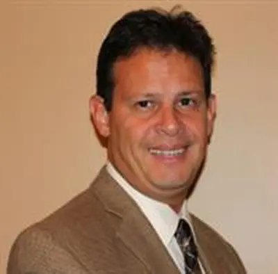 Candido Cotto headshot